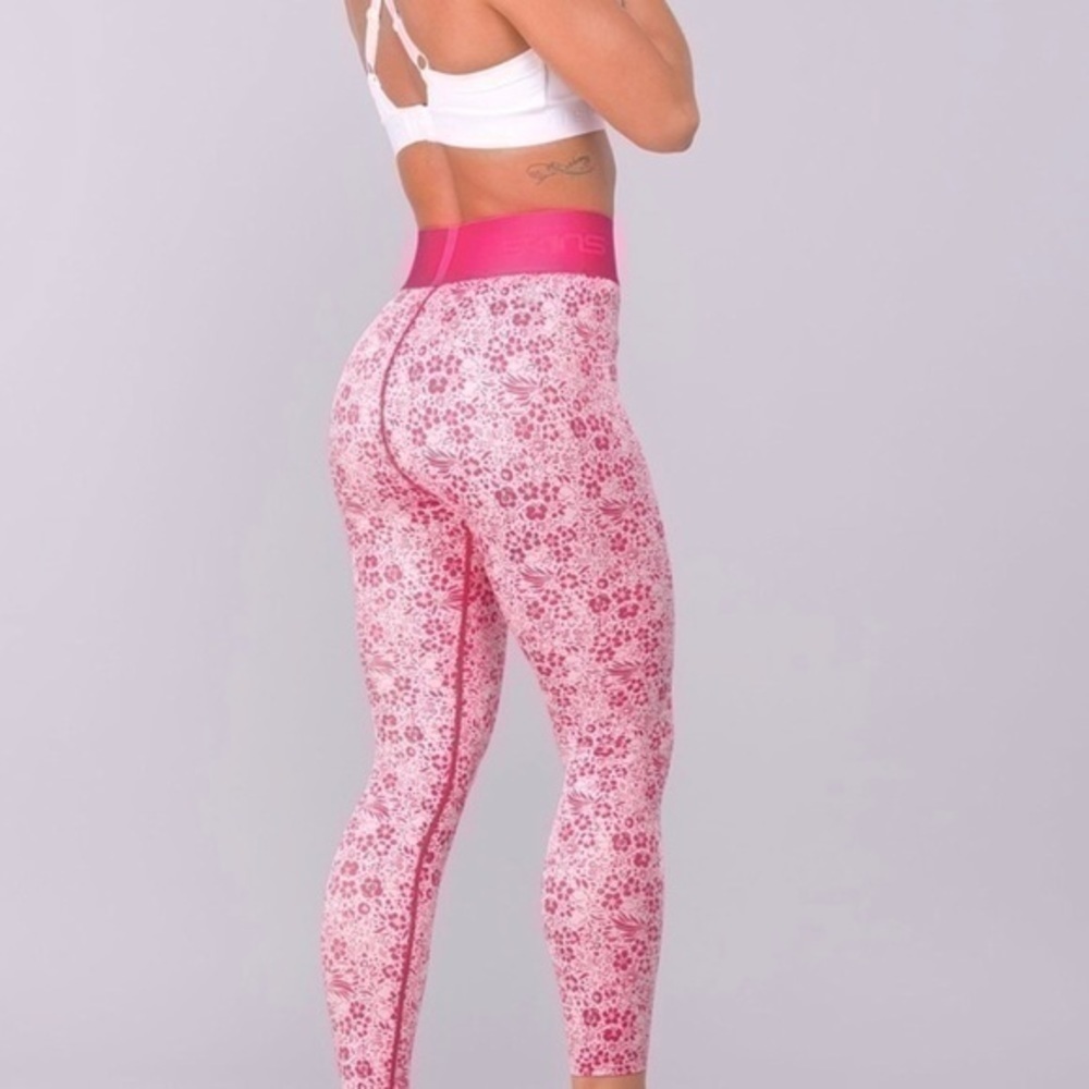 SKINS Pro Performance DNAmic Primary Compression Tights Floral gently preloved - Picture 10 of 14